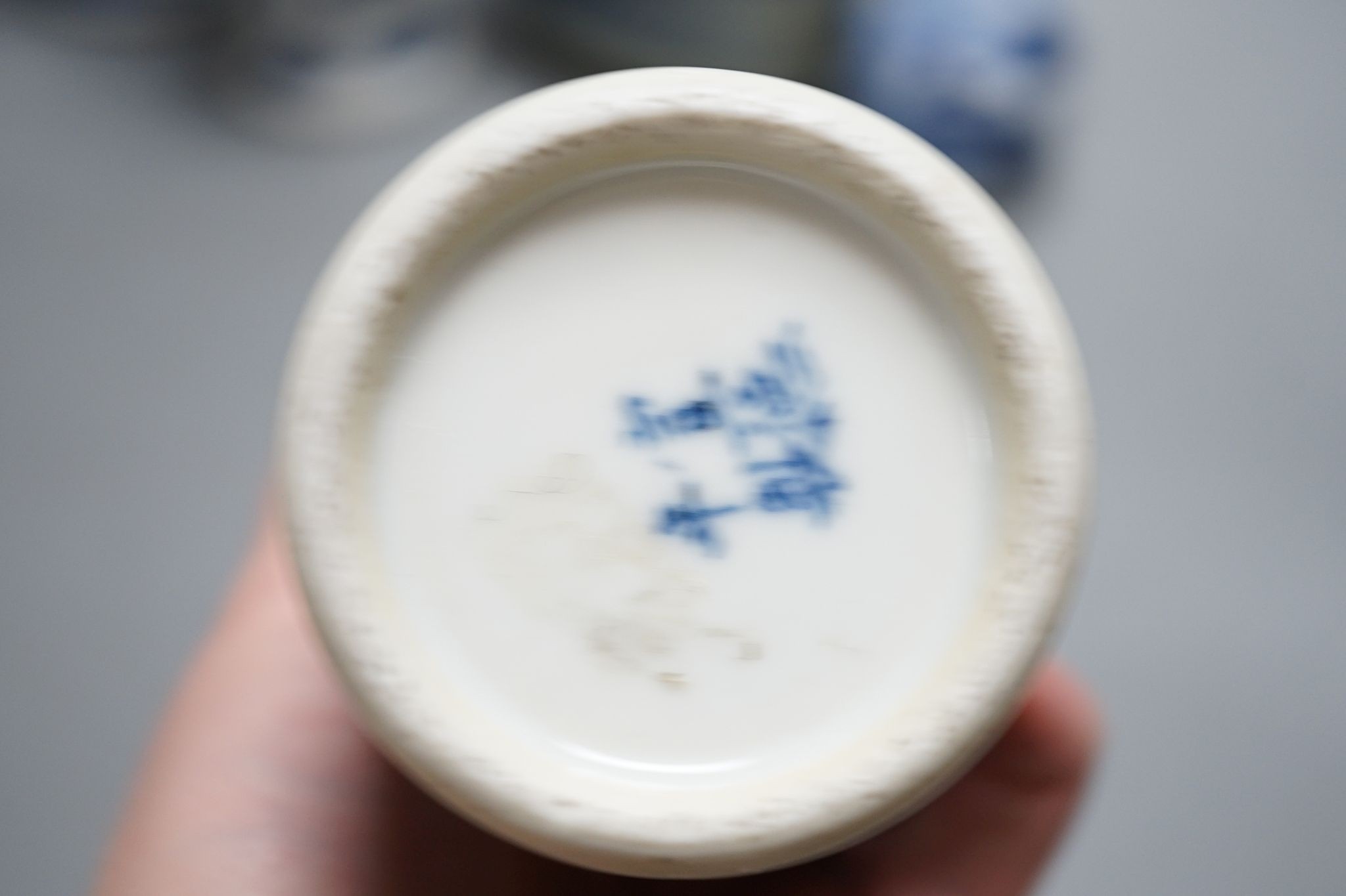 Twelve pieces of 19th century Chinese blue and white tableware and a small famille rose bowl, largest 20cm